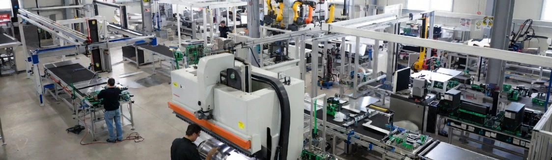Vertically integrated manufacturing facility showing sheet metal fabrication and electronics integration for custom self-service terminal projects and interactive kiosk configurations Vertically integrated manufacturing facility showing sheet metal fabrication and electronics integration for custom self-service terminal projects and interactive kiosk configurations